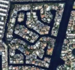 luxury waterfront homes for sale in bay colony, gated island community in northeast ft lauderdale, florida